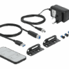 Delock HDMI KVM Switch, medföljande tillbehör: IR-fjärrkontroll, kablar, strömadapter och monteringsfästen