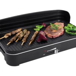 Grillyta på Fritel Starter BBQ 2246 med grillat kött och grönsaker