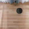 Hoover HG4 robotdammsugare som städar ett rum i systematiska banor